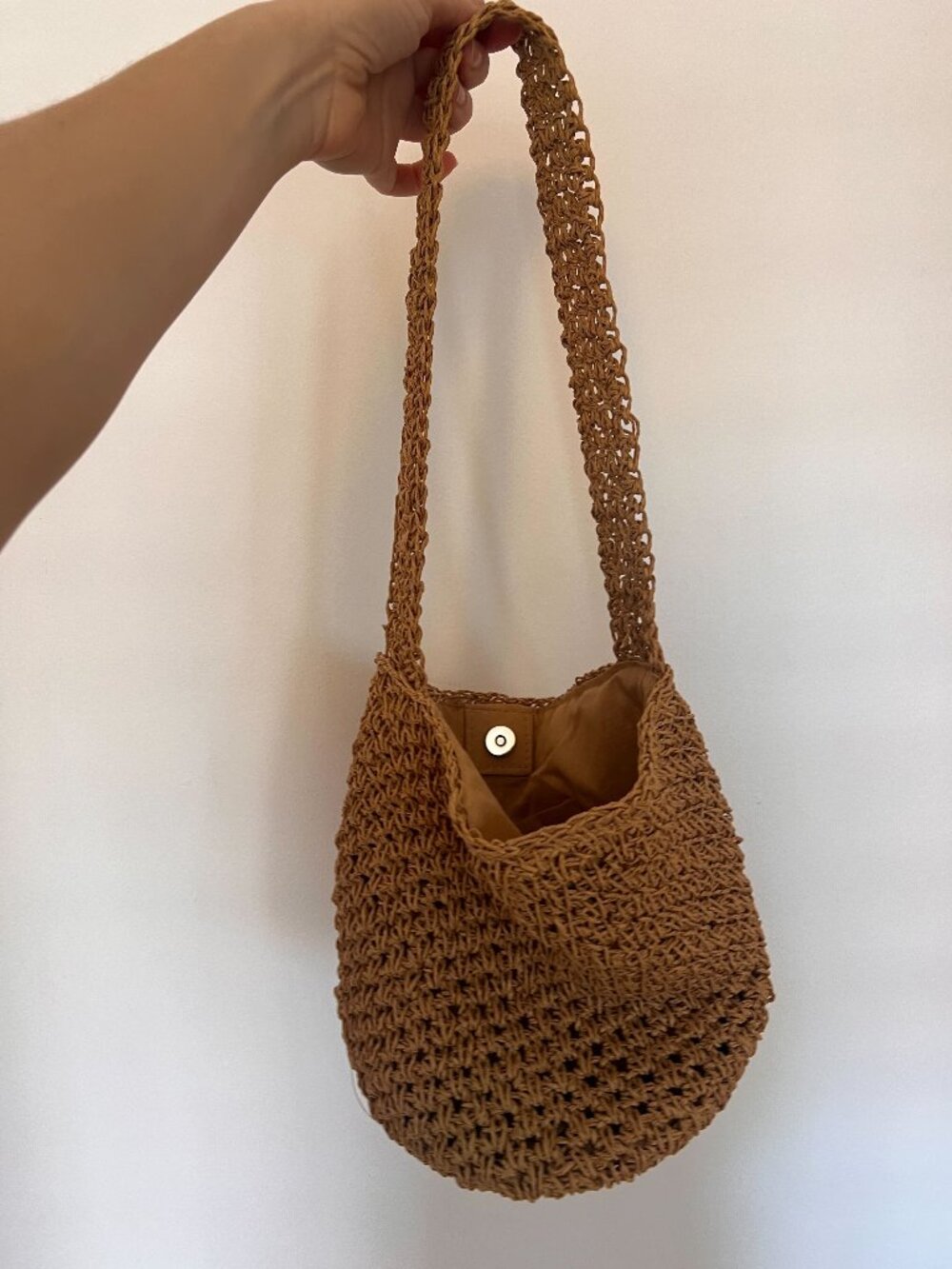 Handwoven straw bucket bag from Spain